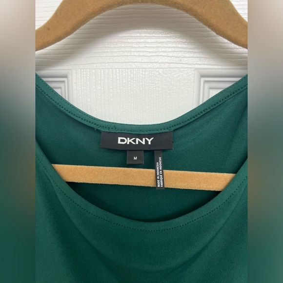 Puff/ruffle sleeve touched top in true emerald green. - Picture 3 of 3